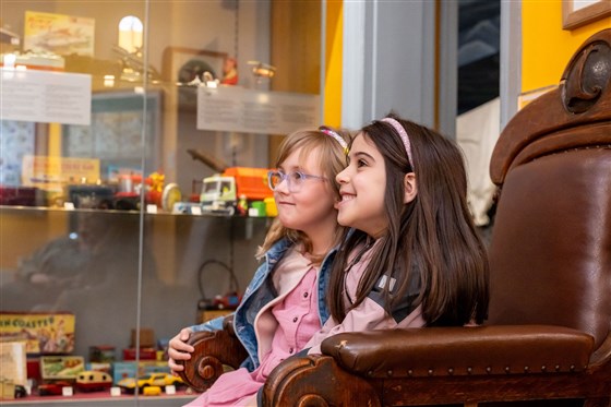 Children watching an old film at Abbey House Museum