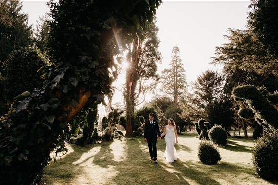 Wedding couple in topiary gardens