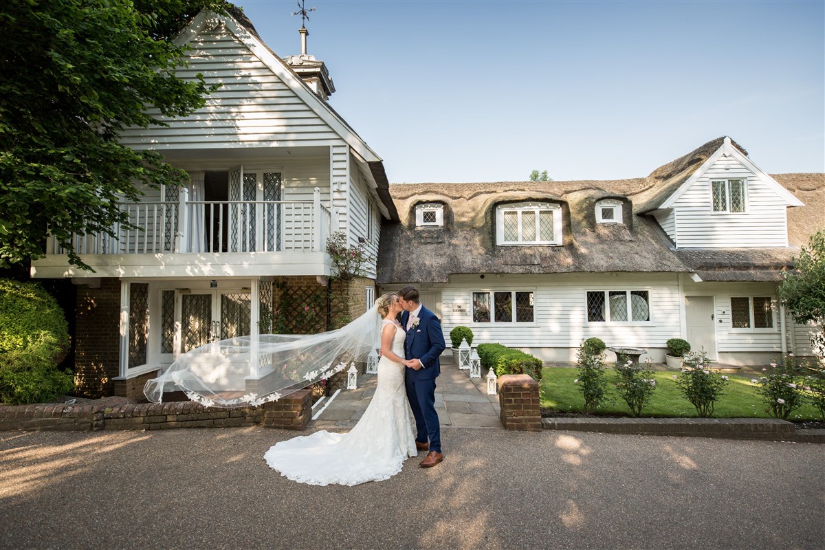 Bride & Groom outside The Clockhouse