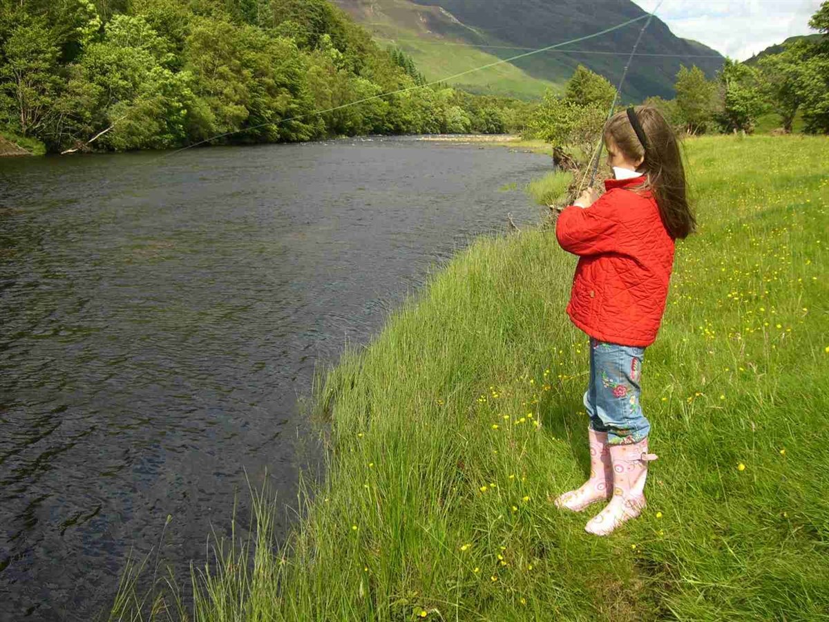 A keen fisherwoman learning the trade