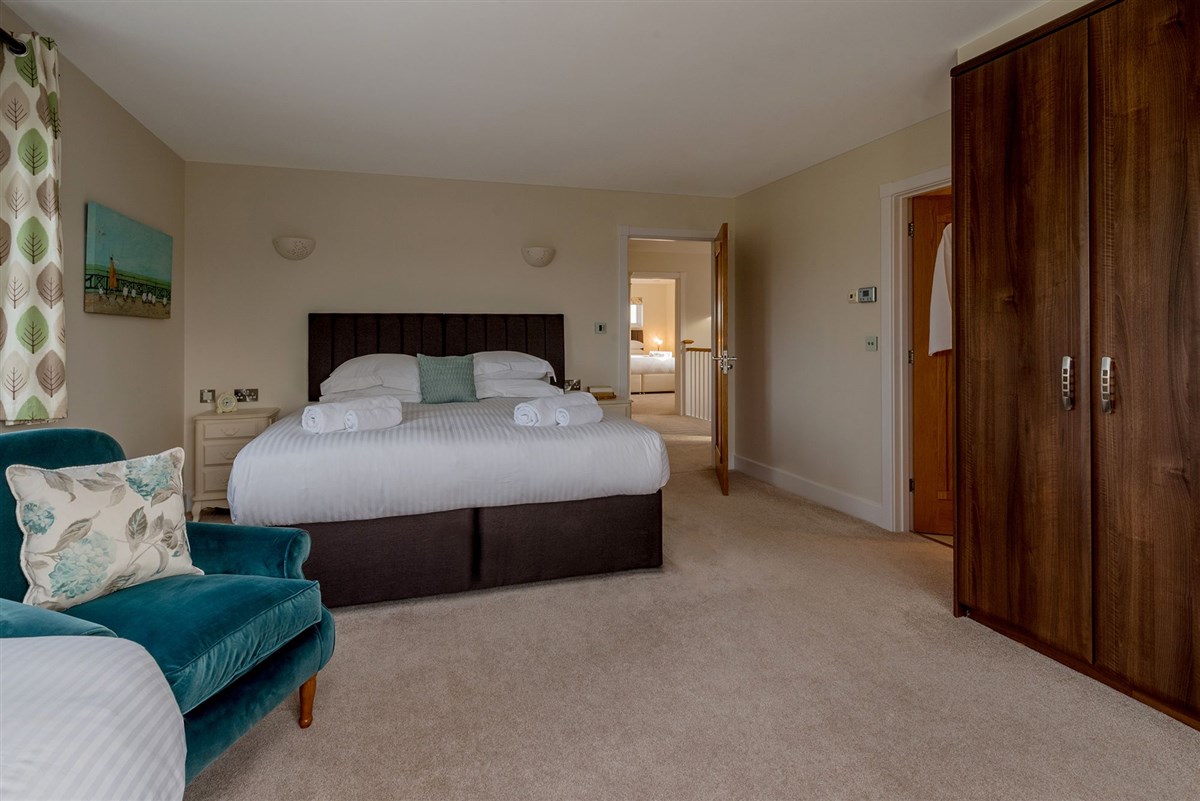 Bedroom 2: Sleeps 3 in a super king and a single, or 3 single beds