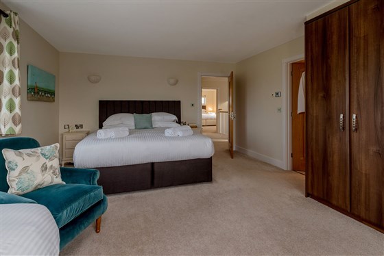 Bedroom 2: Sleeps 3 in a super king and a single, or 3 single beds
