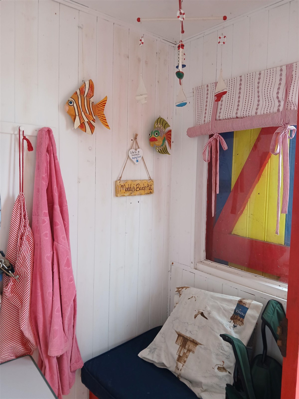 Colorful Beach Huts by the Shore