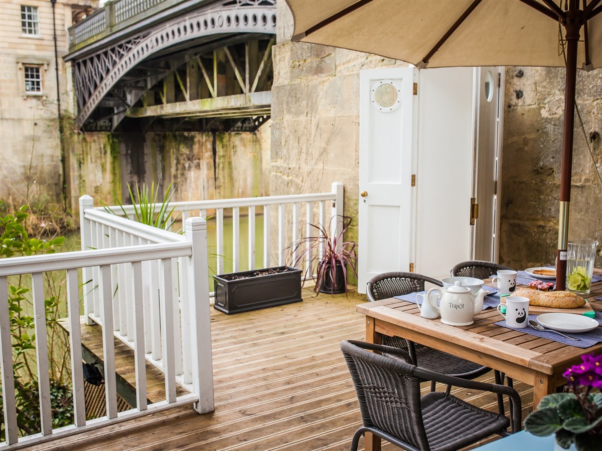 Terrace overlooking the River Avon and historic bridge.
