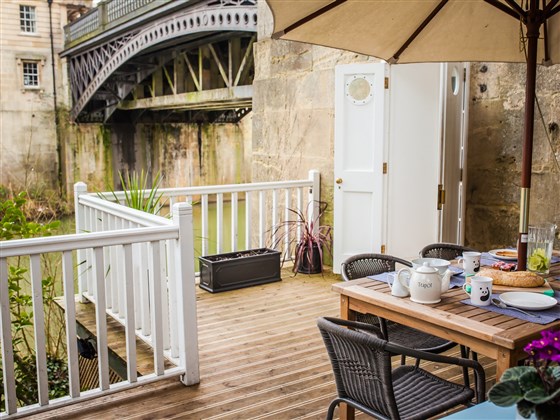 Terrace overlooking the River Avon and historic bridge.