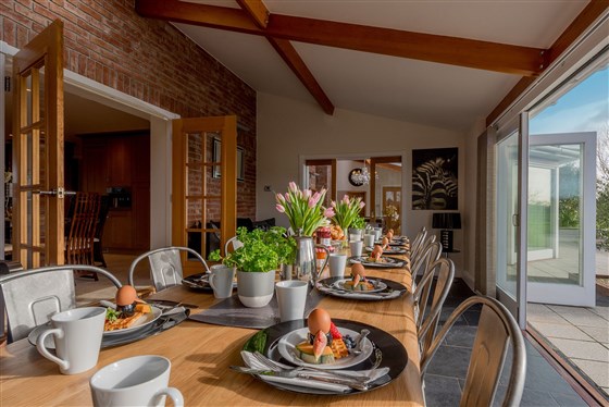 The orangery is a wonderful light and airy dining room