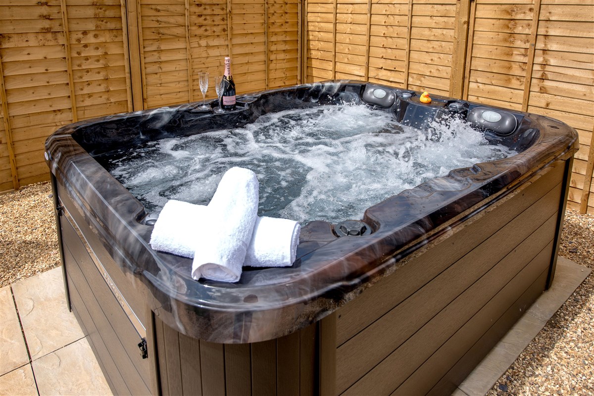 Soak in the hot tub beneath the huge open skies