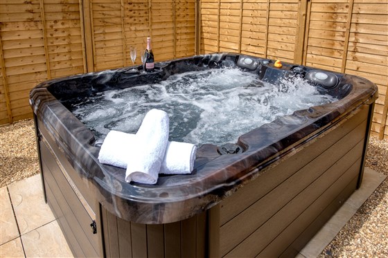 Soak in the hot tub beneath the huge open skies