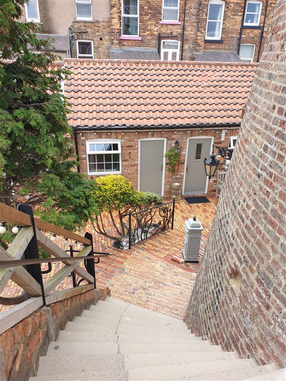 Steps down to reception