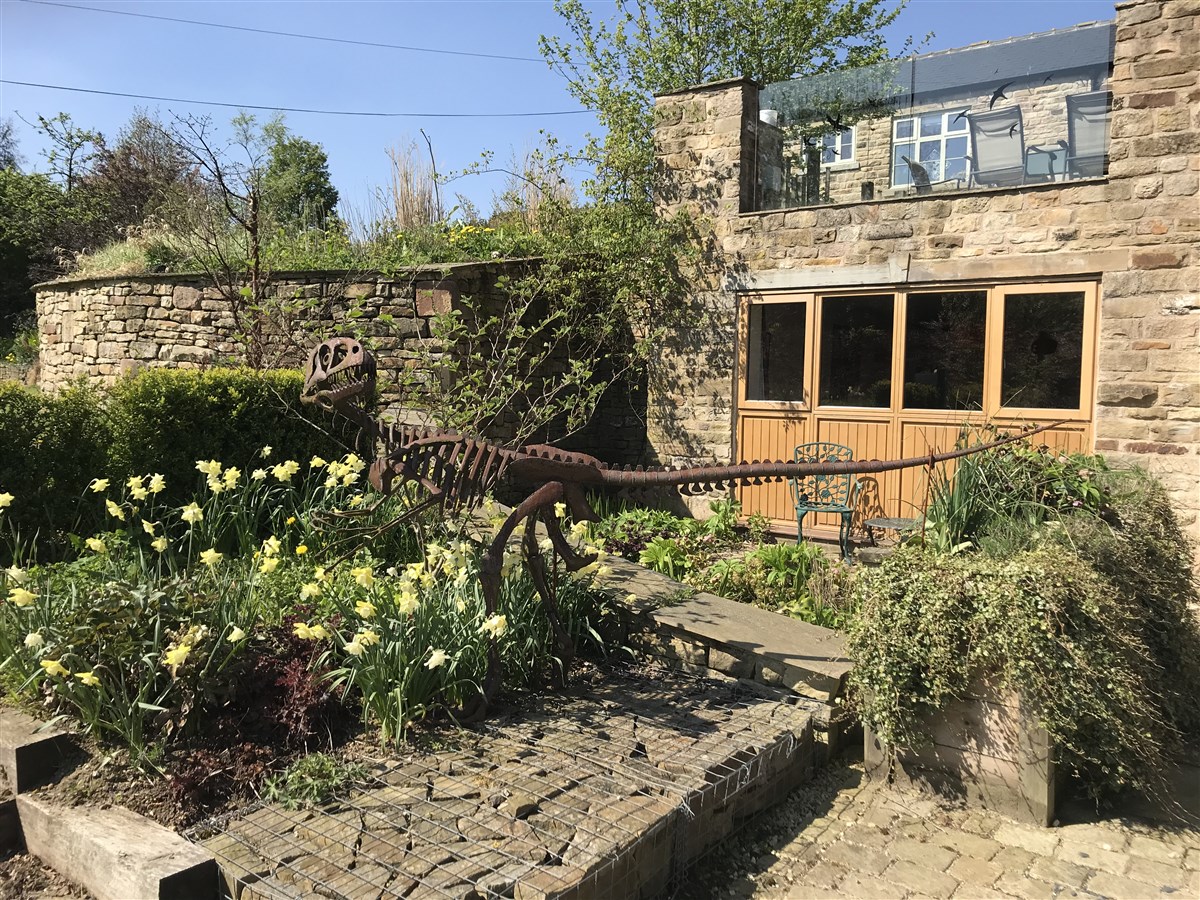 The dinosaur in the garden