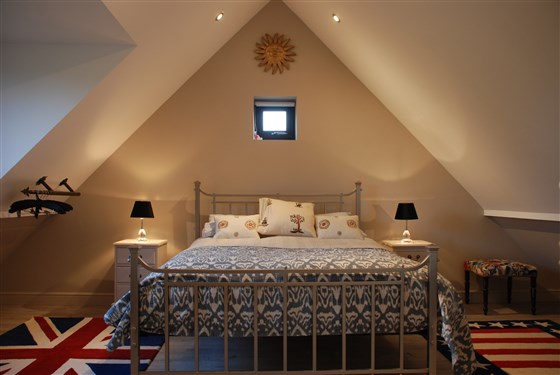 Dormitorio king size con baño privado