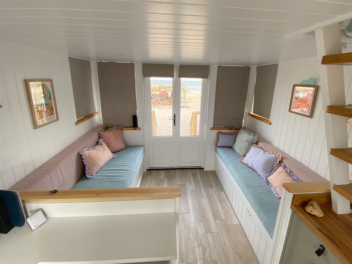 Interior view showing pull our bed and seating with storage