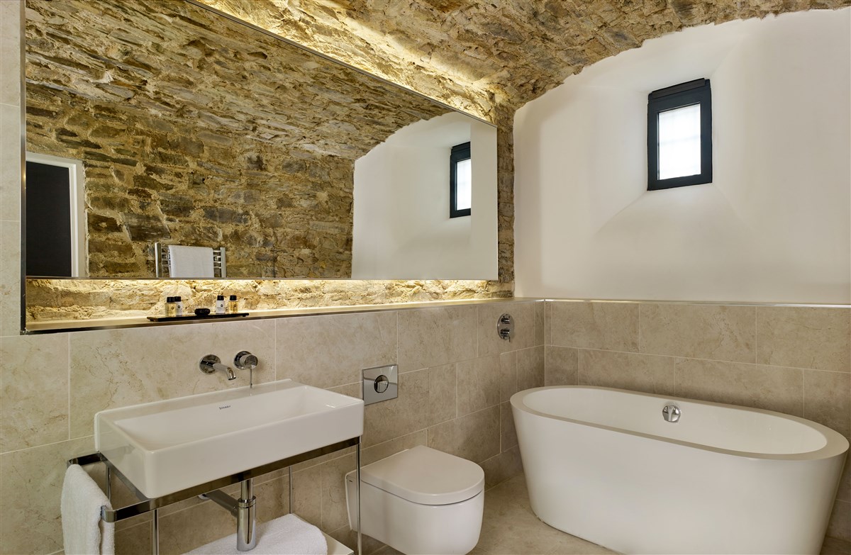 Deep soak bathtub and bathroom