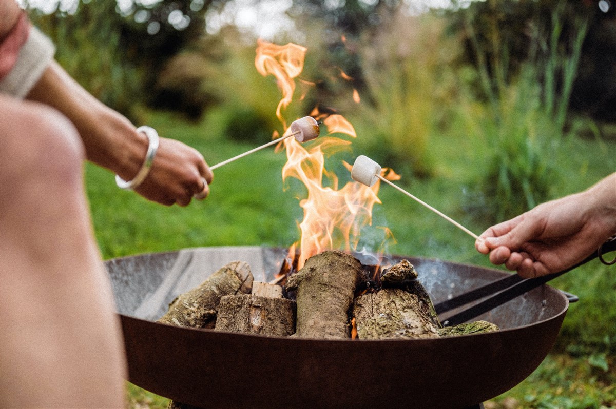 Toasting Marshmallows On Owl Cabin Fire Pit