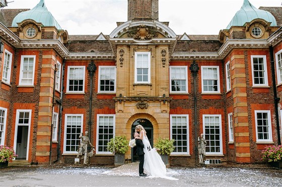 Bride & Groom outside the front of Barnett Hill