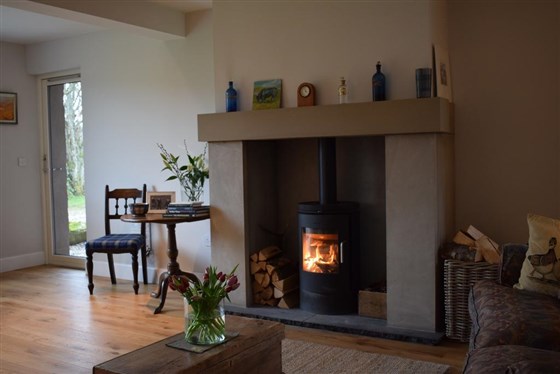 Cosy wood-burner in drawing room