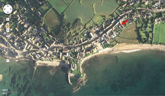 Aerial shot with cottage arrowed