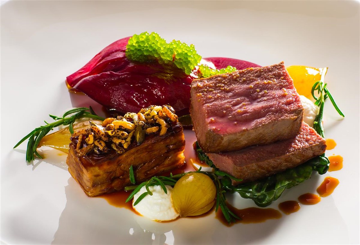 Loin of Launde lamb, pickled aubergine, slowed cooked lamb belly and mint caviar