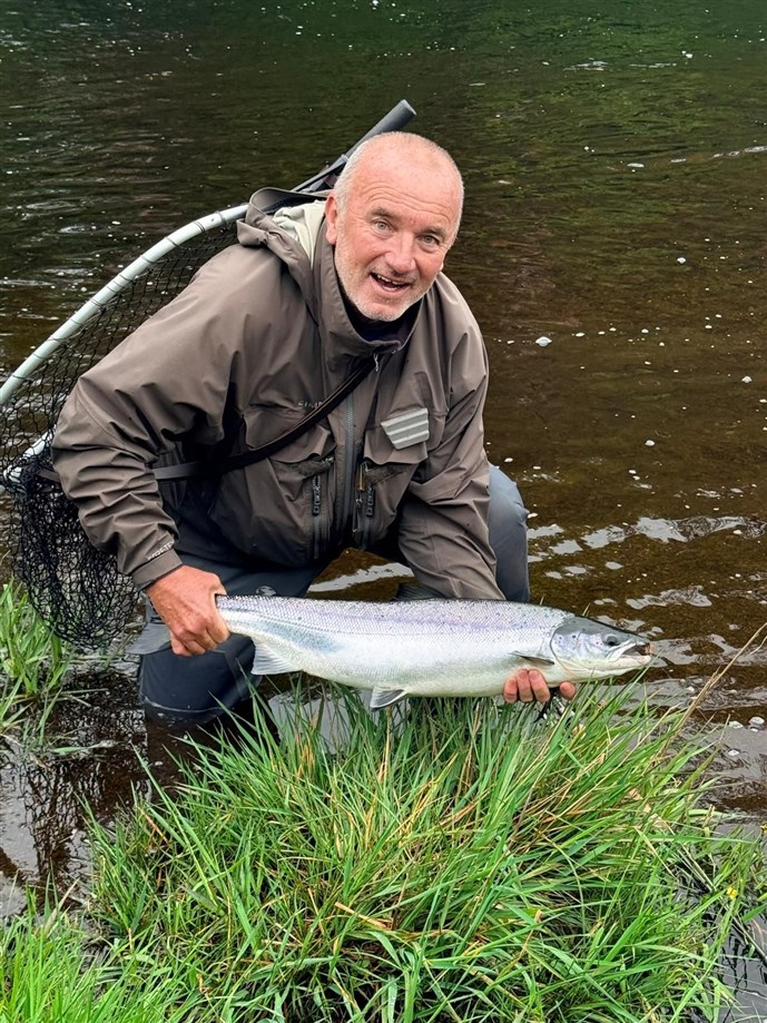 Gary Cunningham with a fish from the suspension pool at the end of May