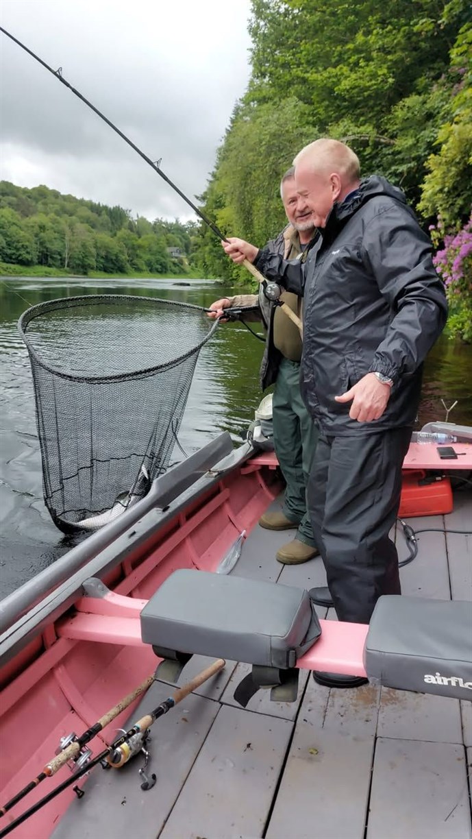 9A. Mr Kevin Jervis lands his first ever Salmon at Ballathie on Friday