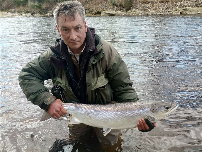 Ali with a fresh Spring salmon of around 19 lbs from Roan pool on Altyre Estate