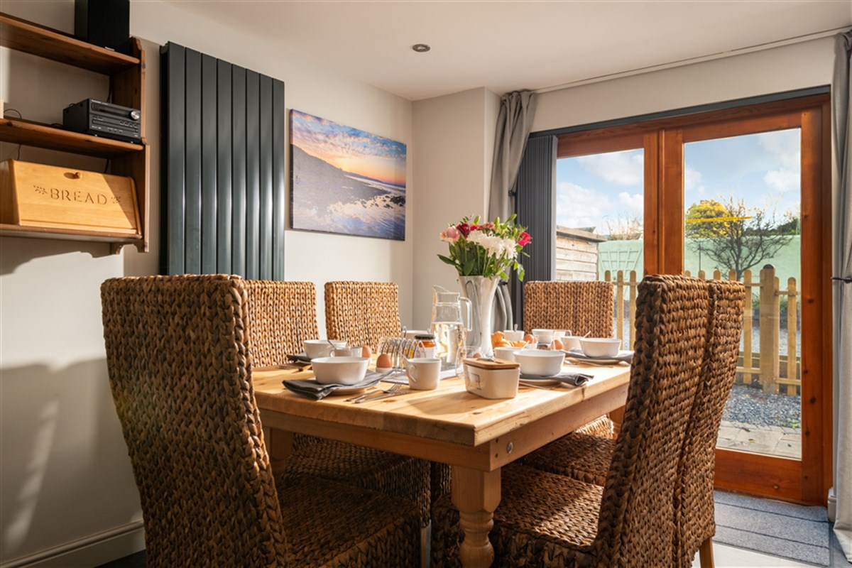 Double doors from the dining area for warm days
